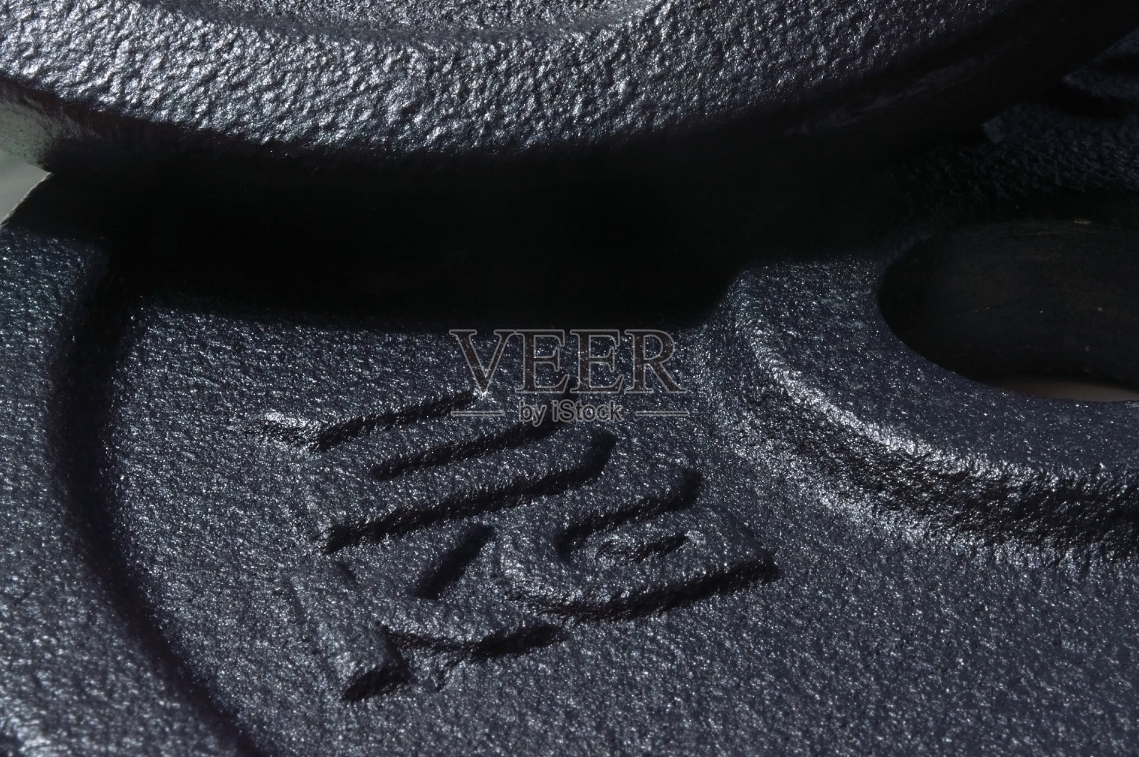 可折叠哑铃的黑色圆盘。照片摄影图片