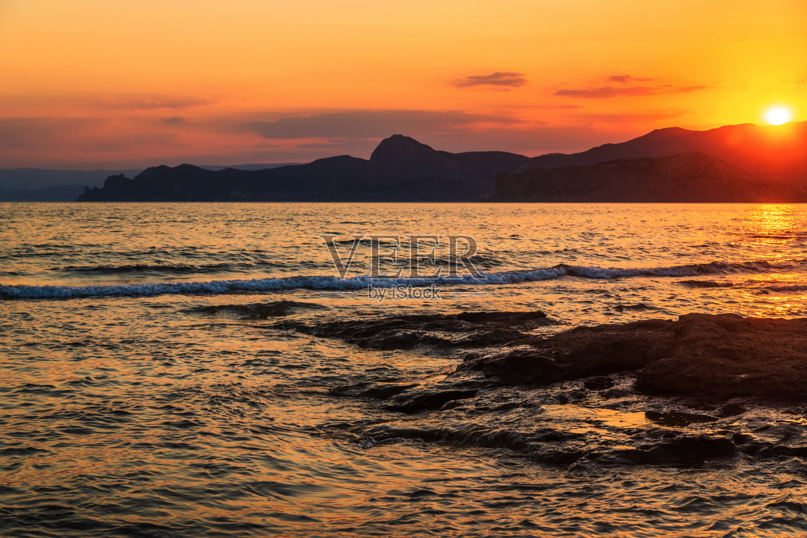 海岸上的日落照片摄影图片