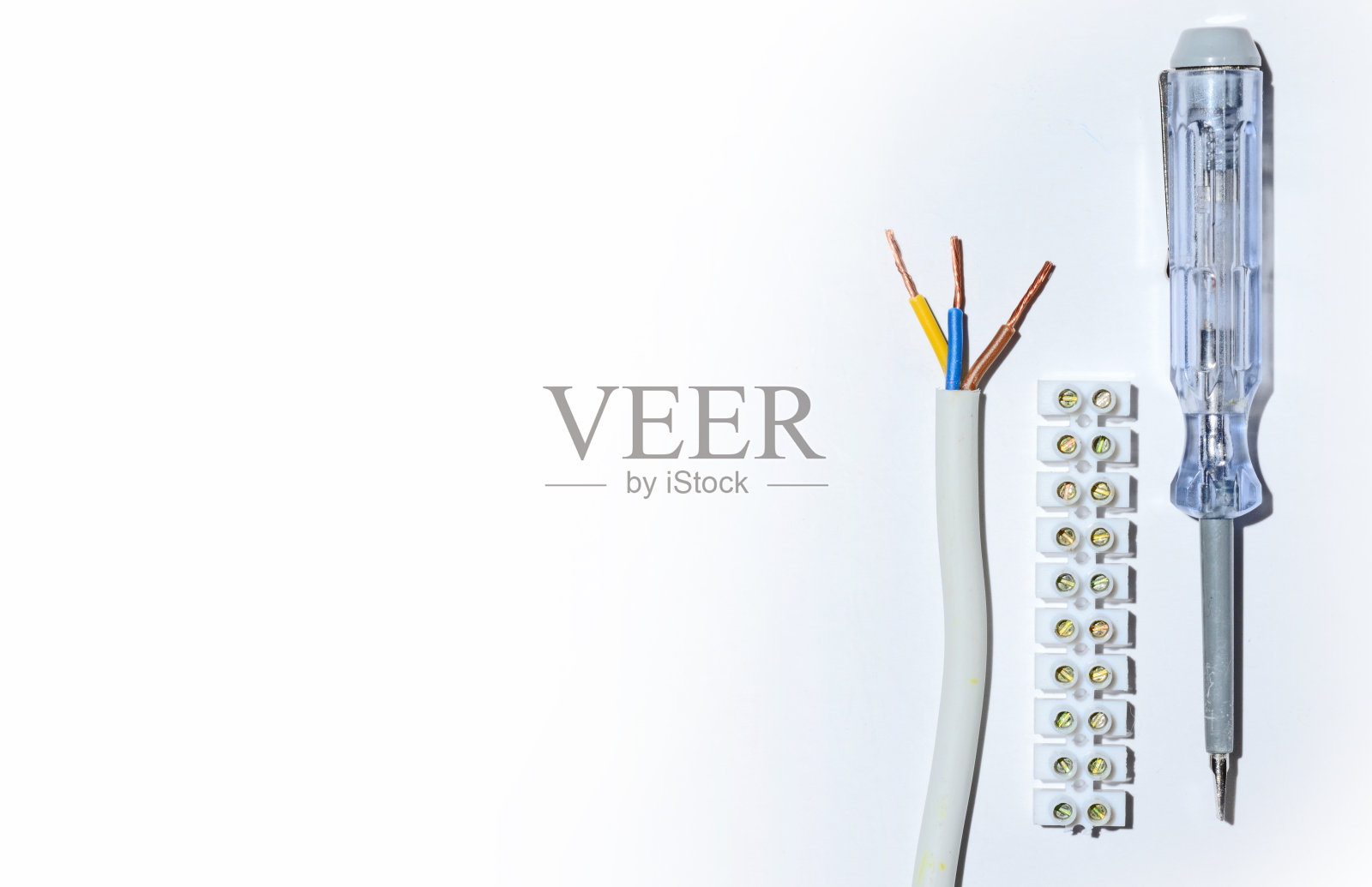 接线端子座和测试螺丝刀。照片摄影图片