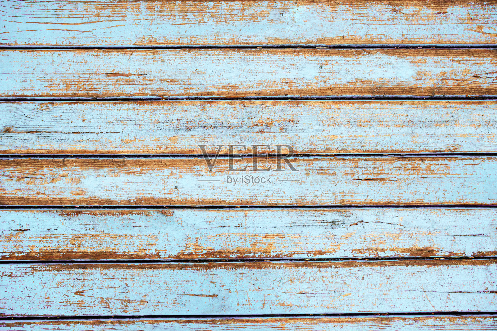 蓝色油漆覆盖的旧木板的纹理照片摄影图片