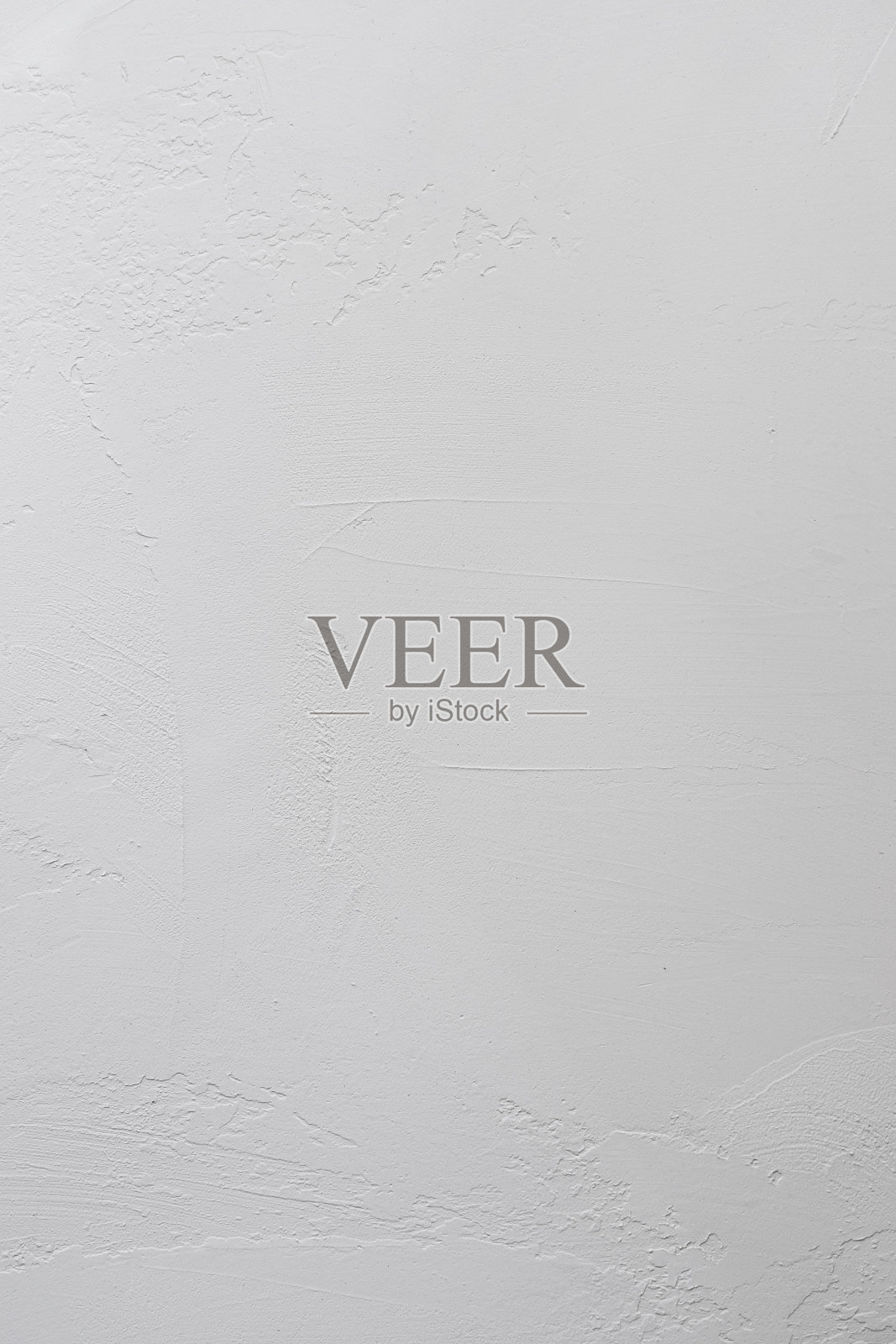 白色的灰泥在墙上特写,垂直的背景照片摄影图片