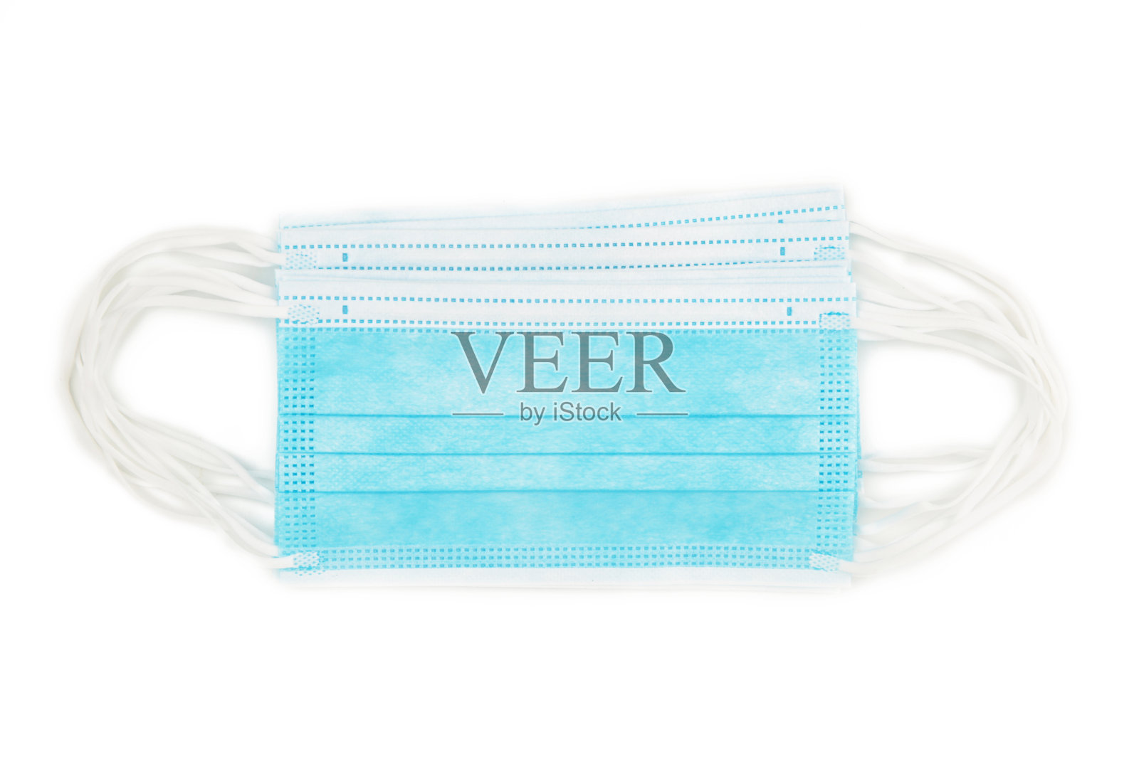 蓝色医用口罩被白色隔离照片摄影图片