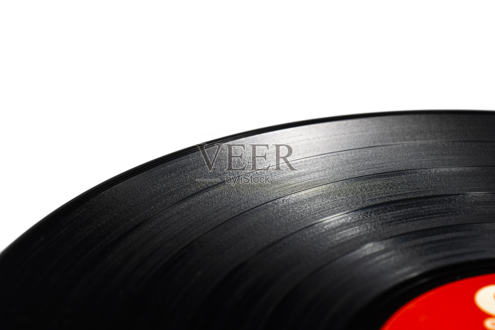 经典的黑胶唱片,旧的黑色在一个白色的背景和几个光盘,长播放和单一。照片摄影图片