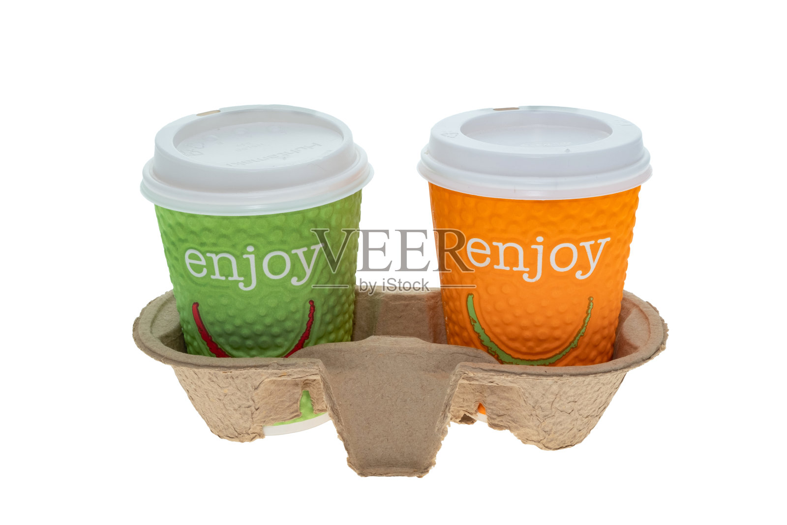 两个咖啡外卖杯放在杯架里照片摄影图片