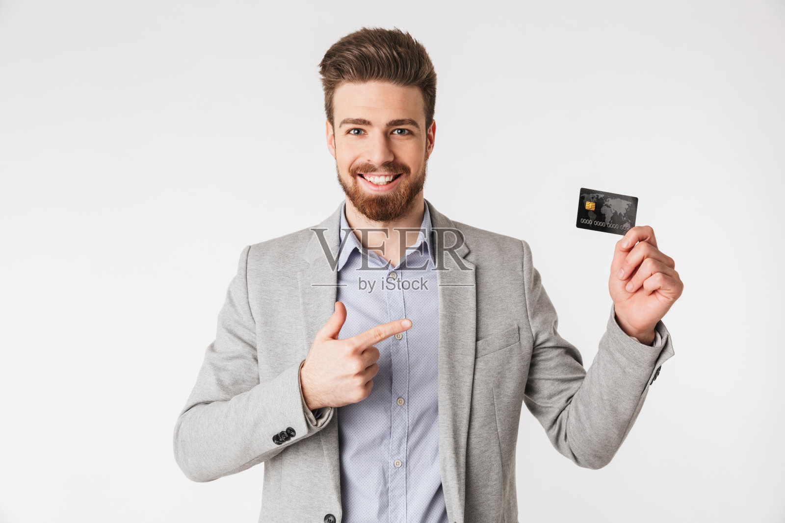 一个穿着衬衫微笑的年轻人的肖像照片摄影图片