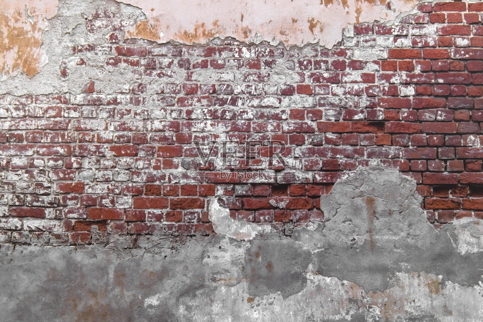 特写混凝土外墙开裂无缝花纹脏抹灰砖纹理。照片摄影图片