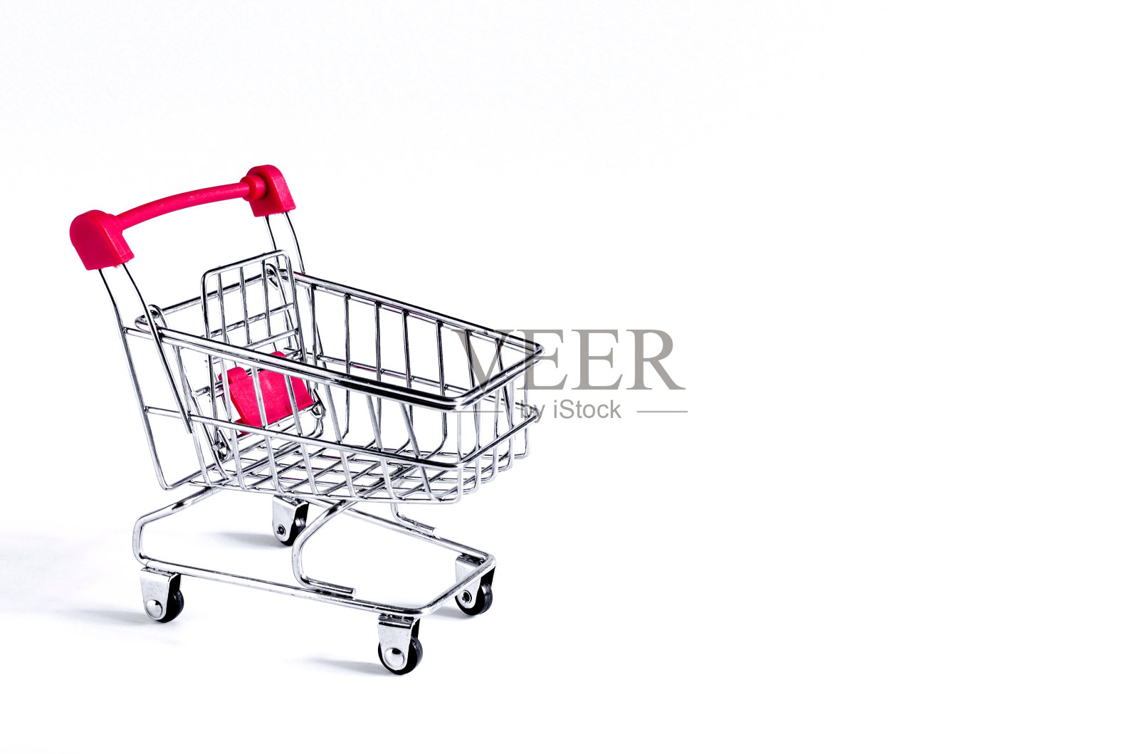 红色的空车在一个白色的背景接近贸易的概念照片摄影图片