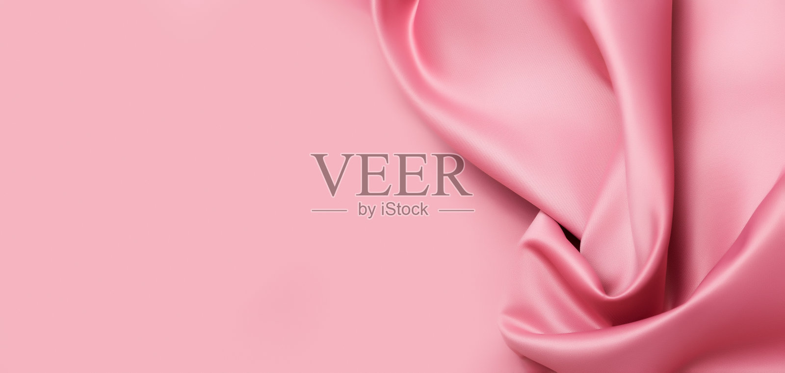 抽象的背景。奢华的布料或液体波浪或波浪褶皱的垃圾真丝纹理缎丝绒材料,优雅的墙纸设计。柔和的粉红色布料照片摄影图片