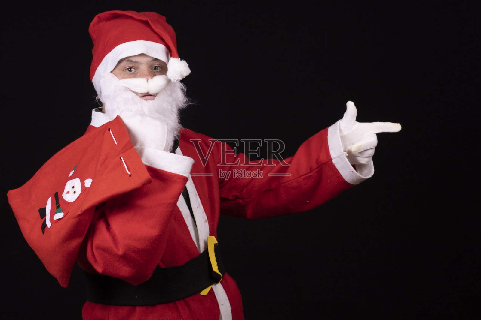 唐氏综合征患者装扮成圣诞老人照片摄影图片