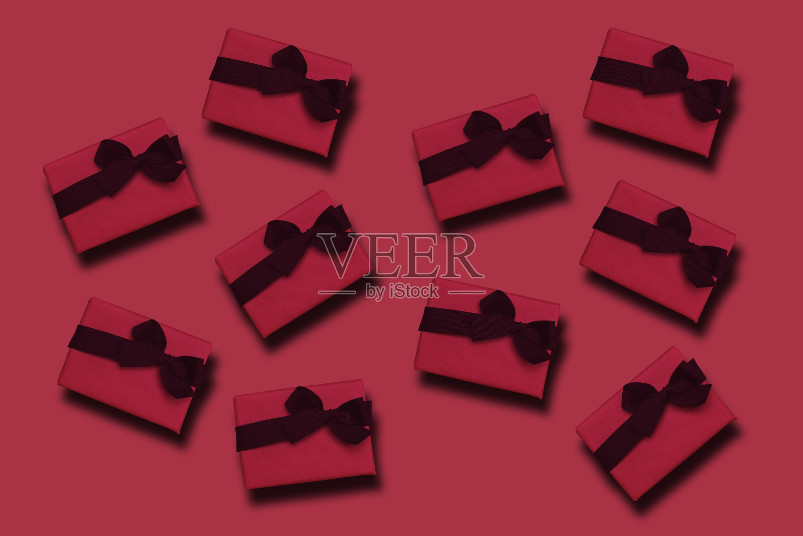 圣诞礼物背景设计的时尚礼物包装礼物在一个素色的背景照片摄影图片