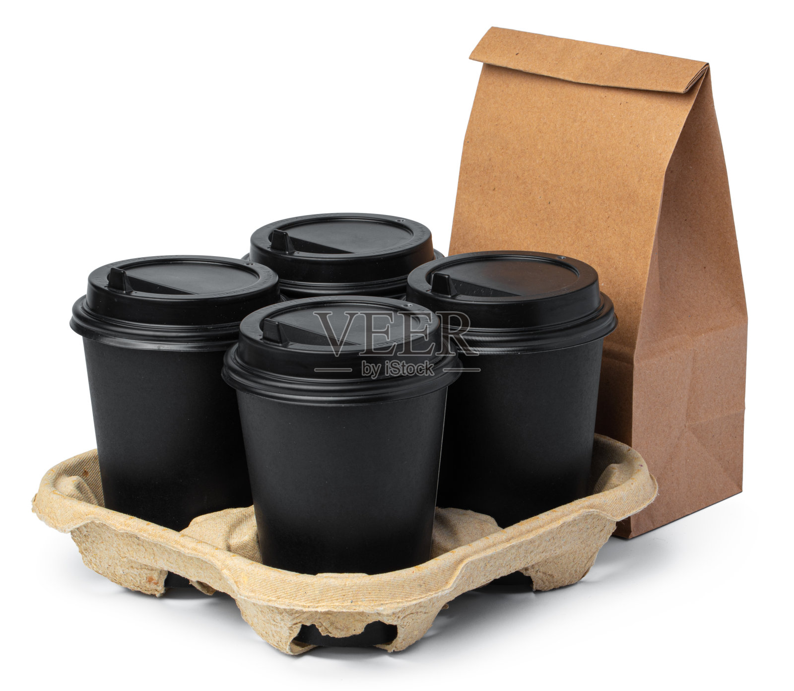 工艺纸袋与咖啡杯在白色的背景照片摄影图片