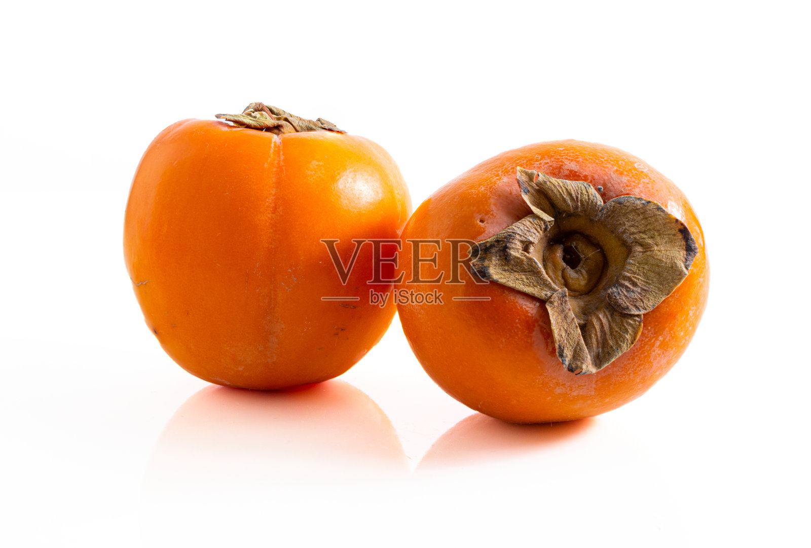 两个成熟的柿子孤立在白色上照片摄影图片