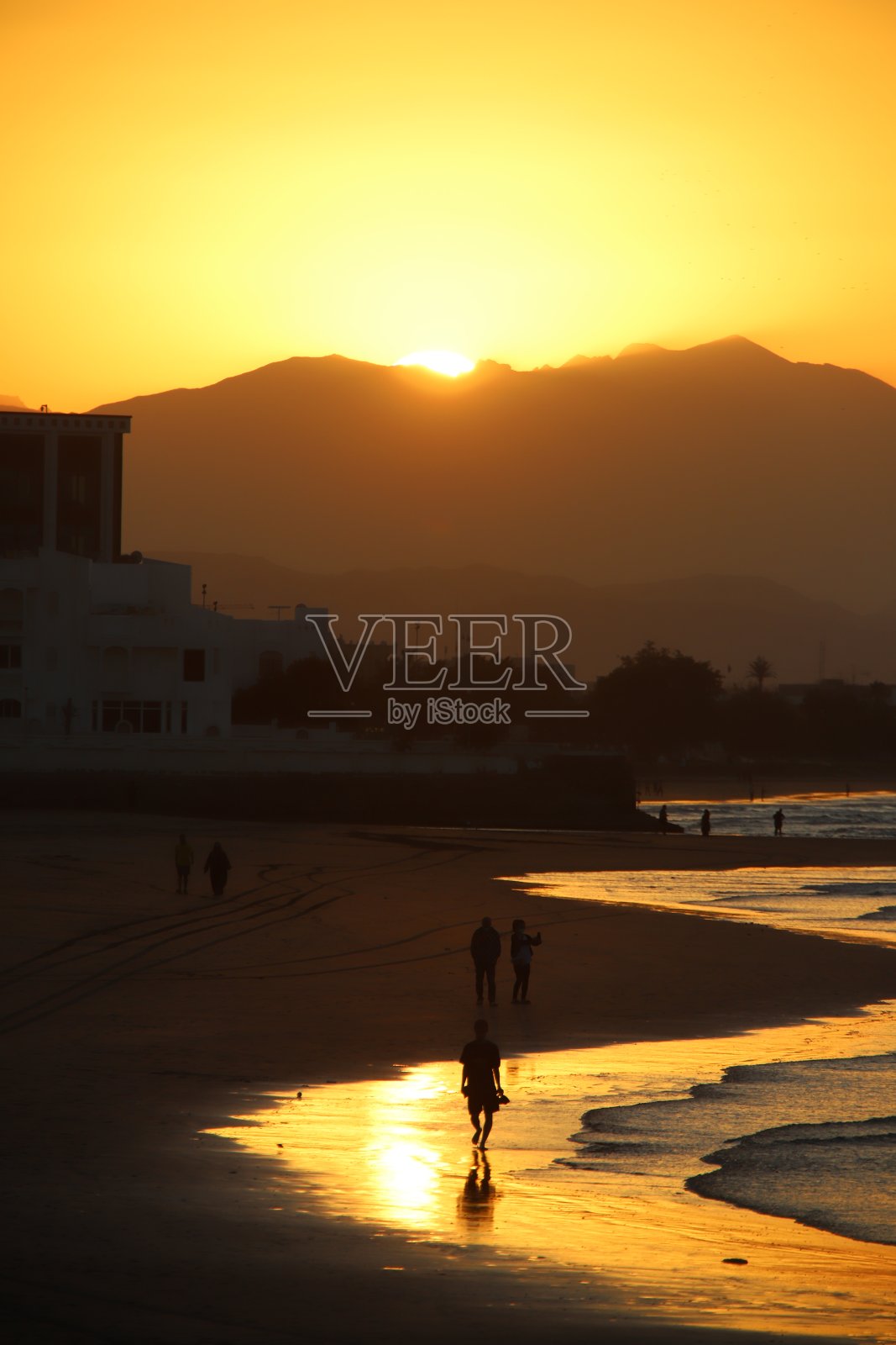 阿曼海滩的轮廓照片摄影图片