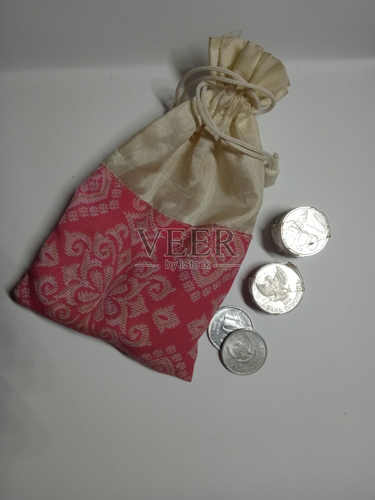 硬币袋照片摄影图片