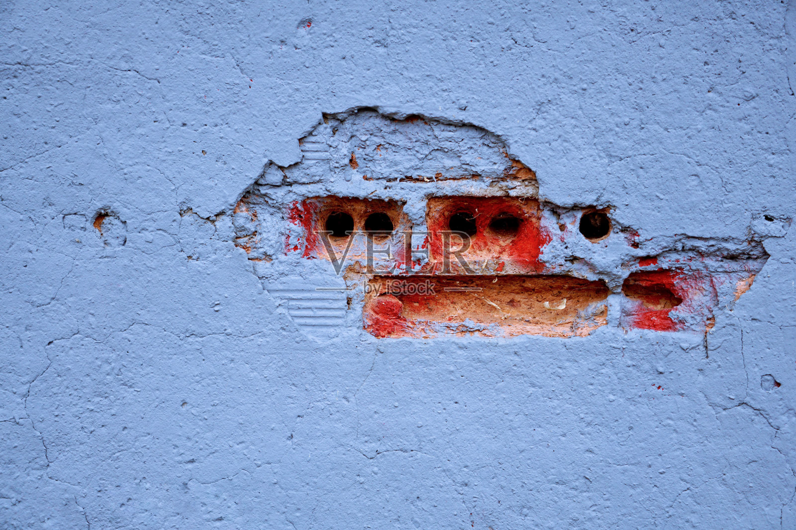 蓝色的破墙立面,蓝色的背景照片摄影图片