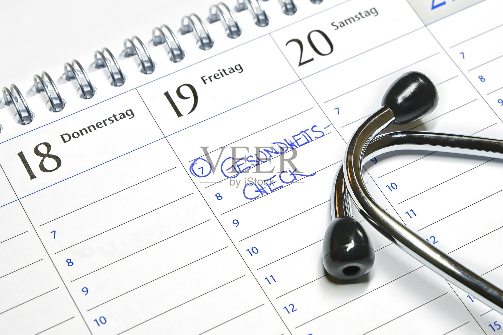 日历上的说明-预约进行预防性体检照片摄影图片