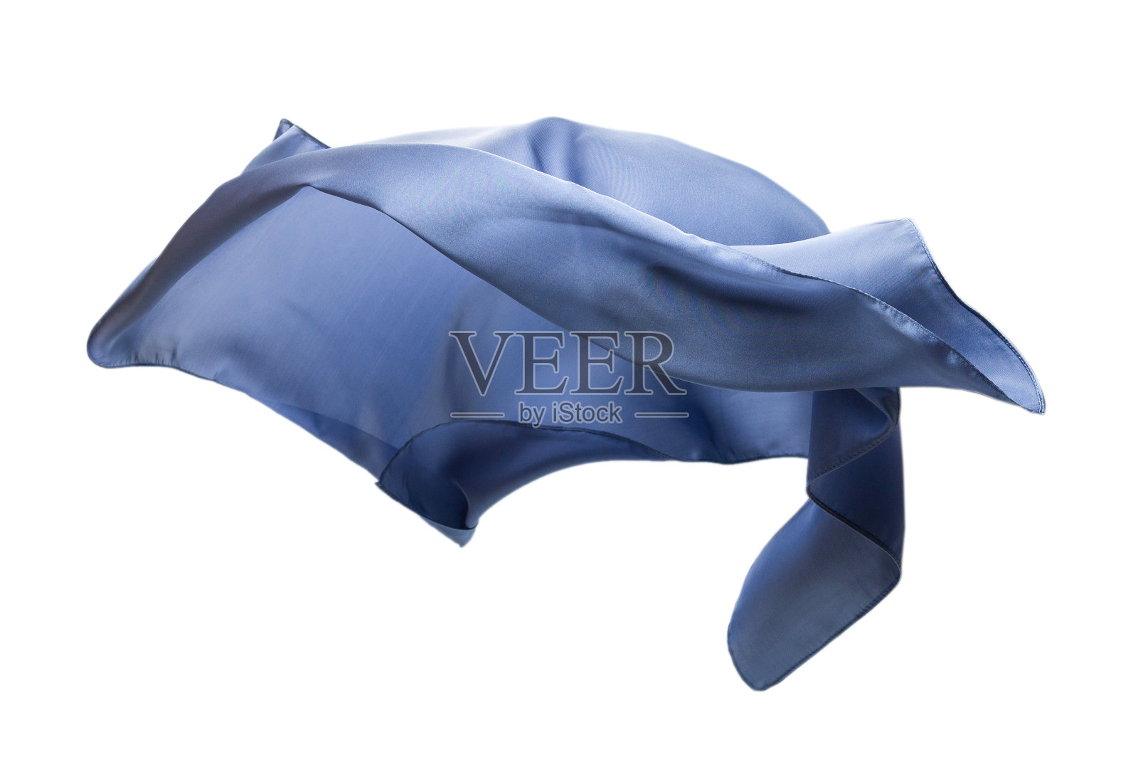 飘逸的蓝色丝巾孤立在白色背景上。照片摄影图片