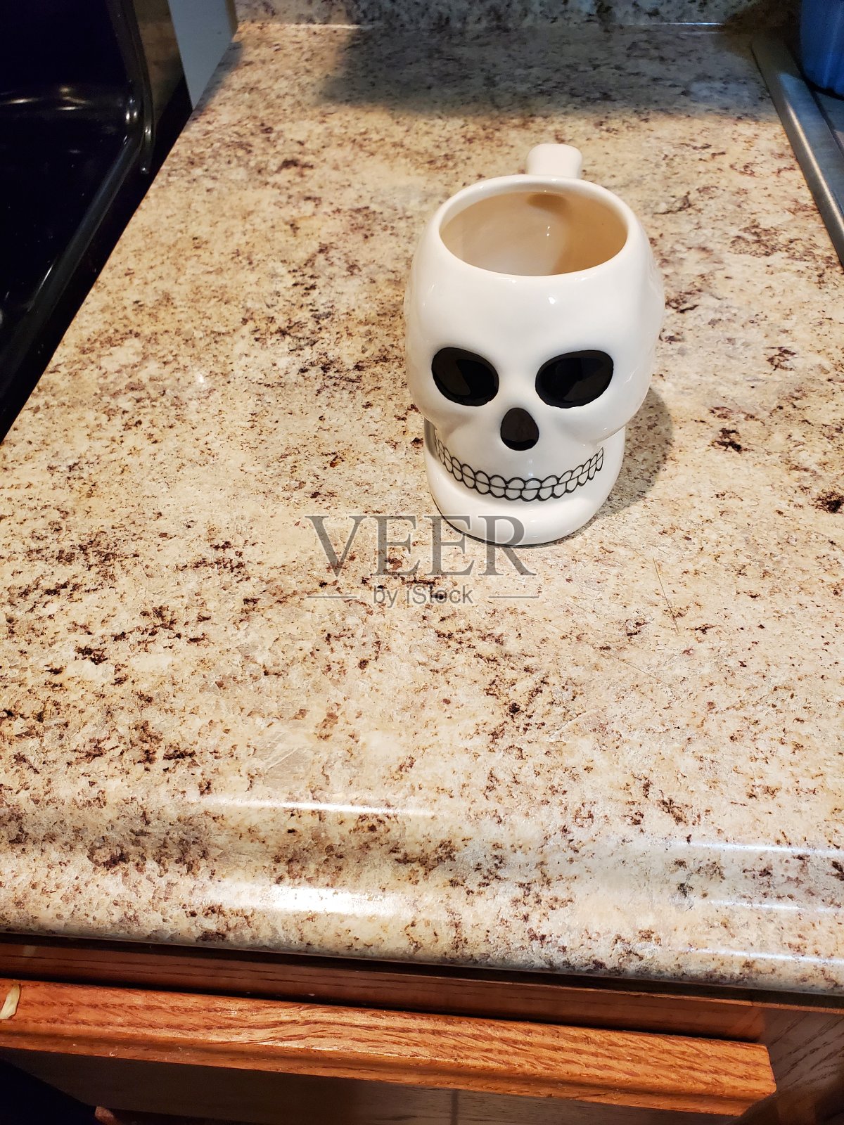 骷髅杯面照片摄影图片