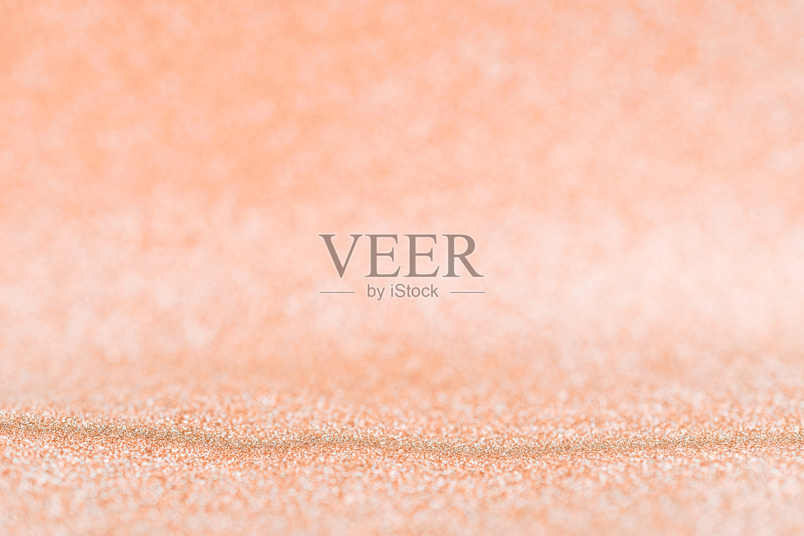 抽象的黄金背景。圣诞闪光金色图案与明亮的闪光bokeh纹理为圣诞闪光银色设计。庆祝,奢华的派对概念。照片摄影图片