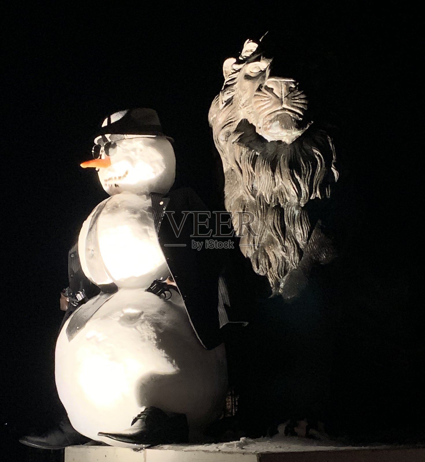 圣诞匪徒雪人和狮子照片摄影图片