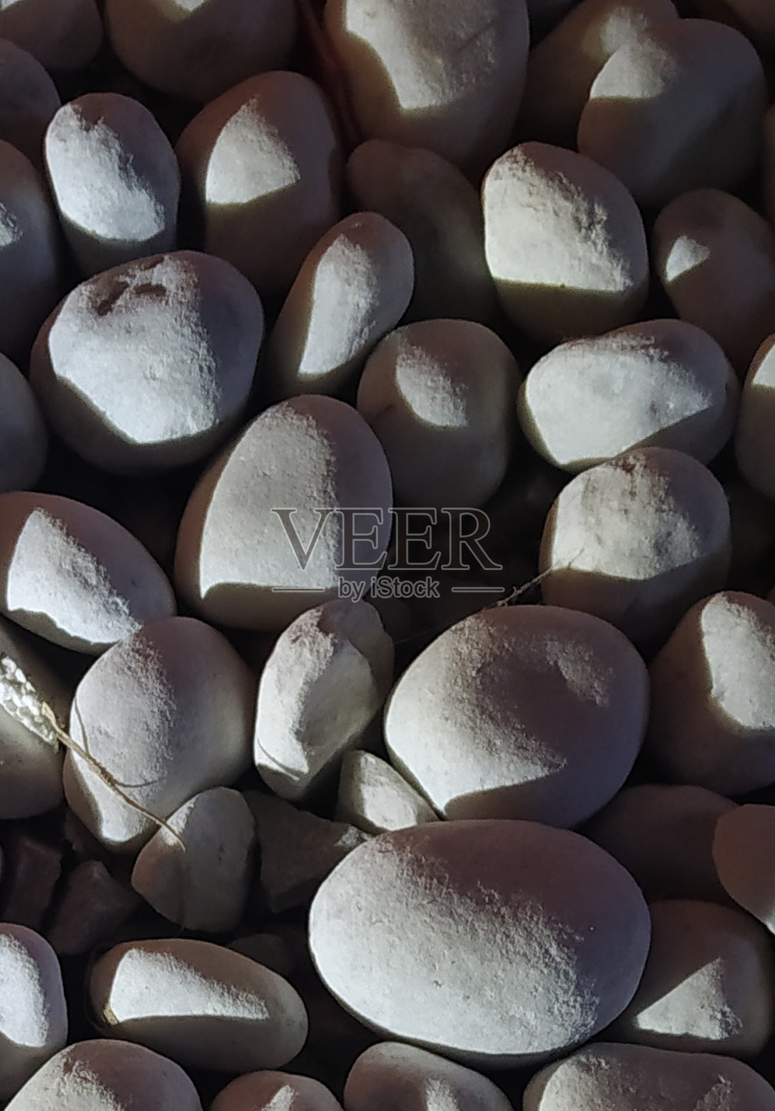 白色卡拉拉大理石鹅卵石照片摄影图片