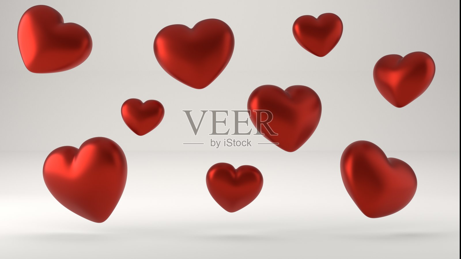 白色背景下的大情人节心。照片摄影图片