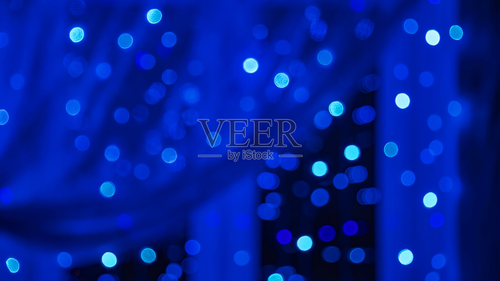 抽象模糊的蓝色色调的光模式照片摄影图片