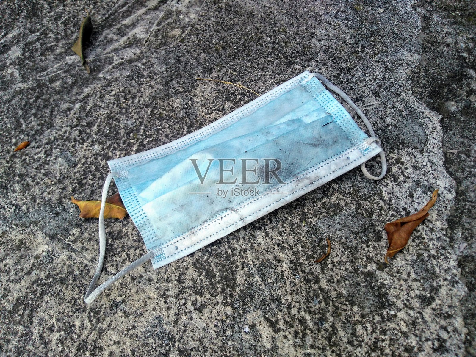 地板上的防护口罩照片摄影图片