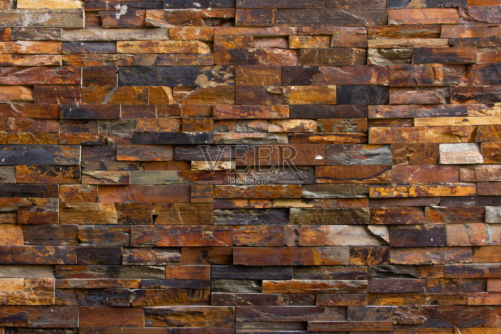 砖墙有不同的纹理、形状和颜色。背景。照片摄影图片