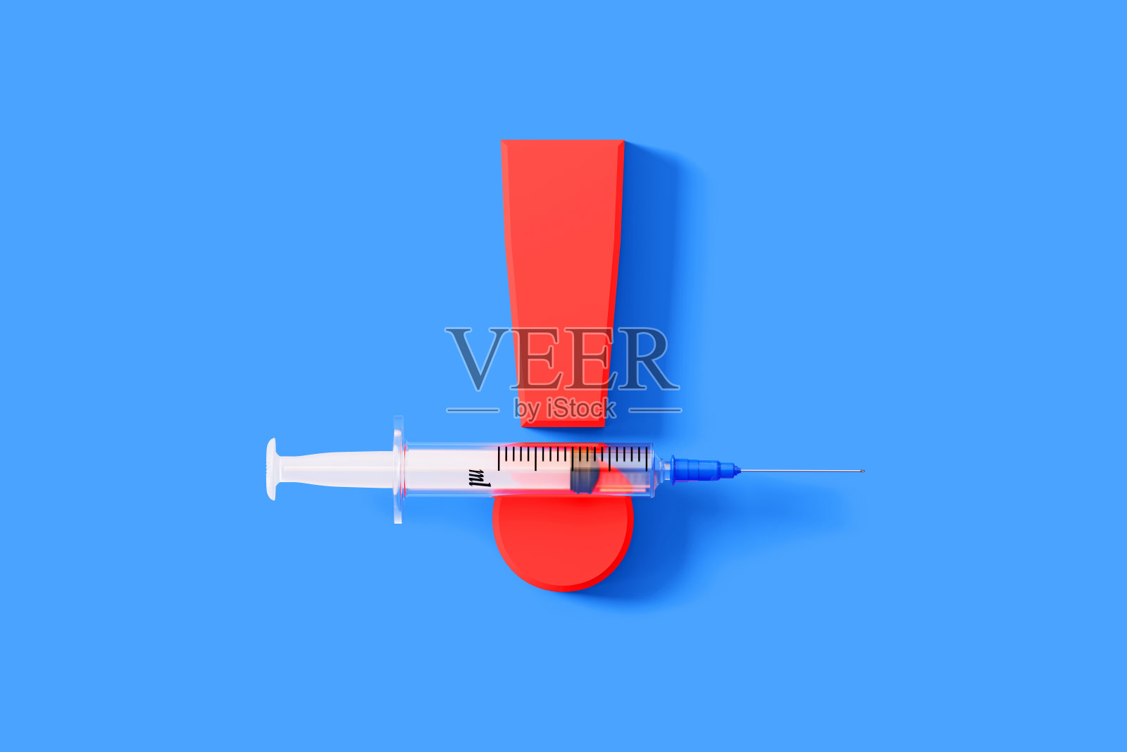 注射器坐在一个巨大的红色感叹号在蓝色的背景照片摄影图片