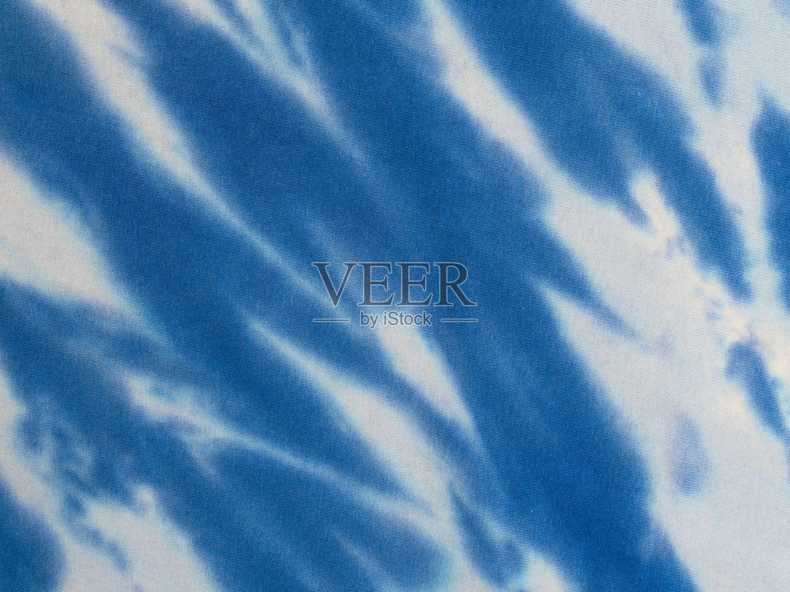 蓝色的扎染,扎染模或扎染模布织物照片摄影图片