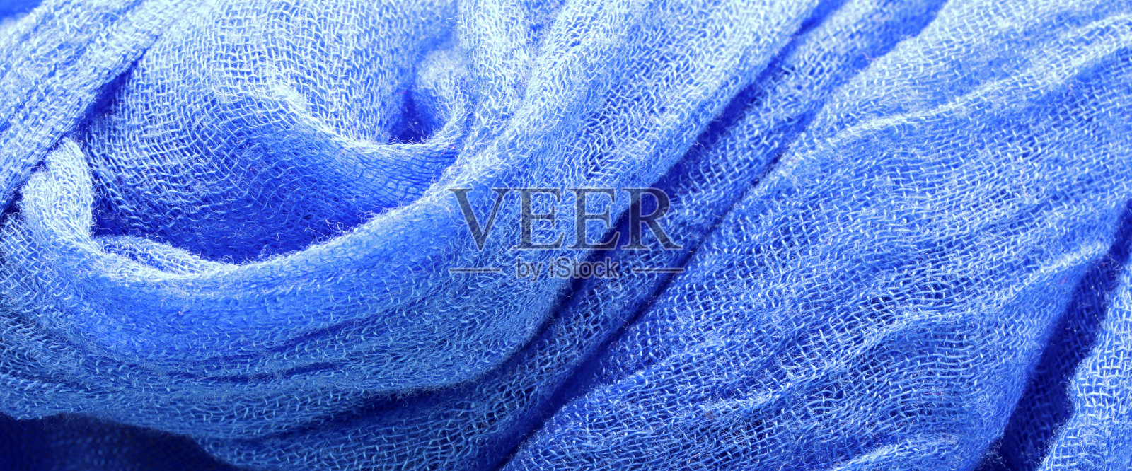 特写蓝色织物纹理背景照片摄影图片