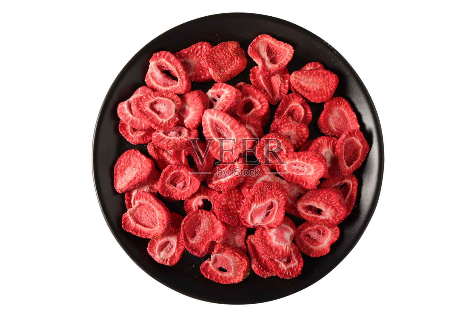 准备食用的草莓干片。照片摄影图片