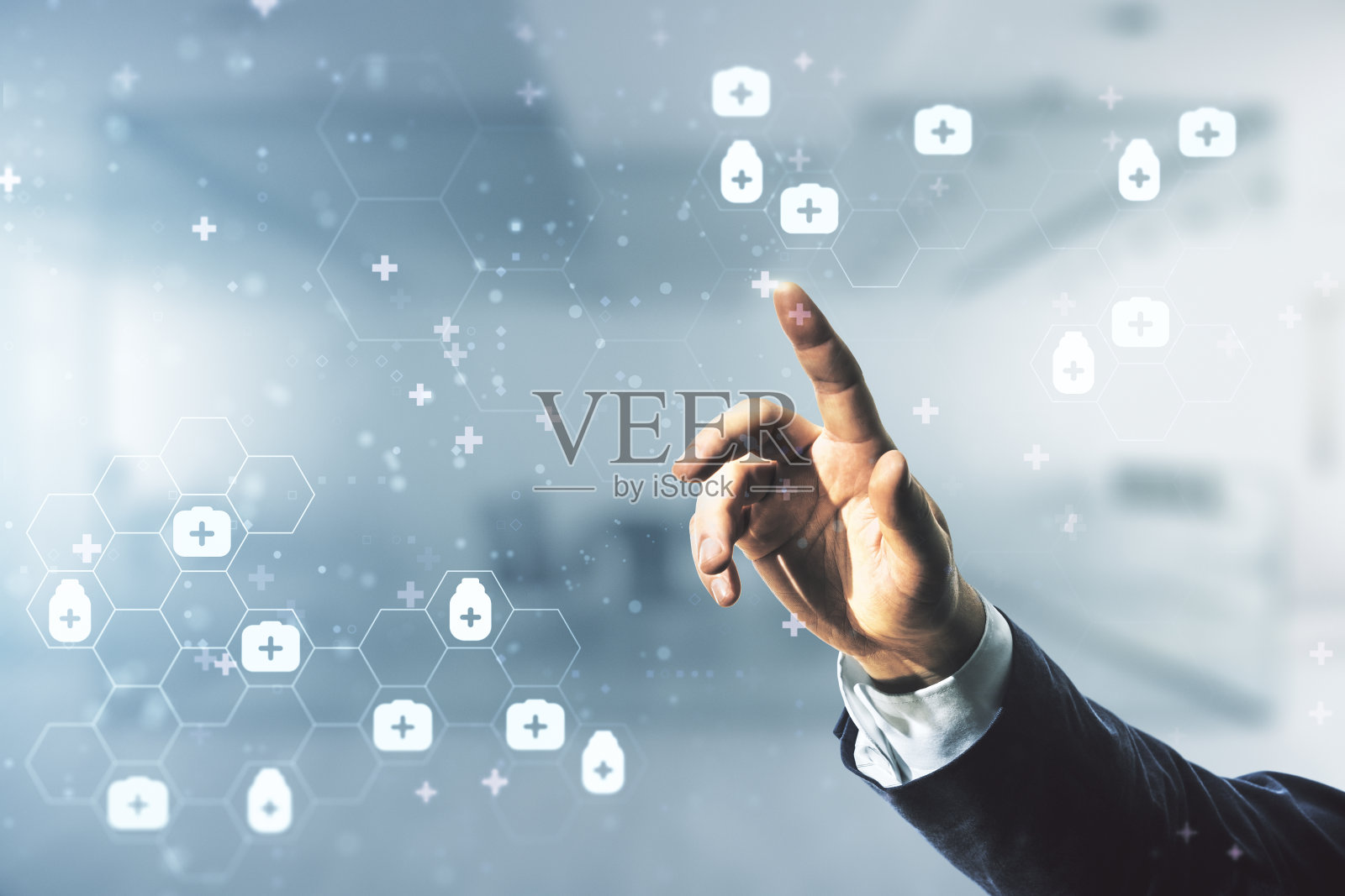 男性的手在模糊的办公室背景上点击抽象的虚拟医疗草图。医疗保健理念。Multiexposure照片摄影图片