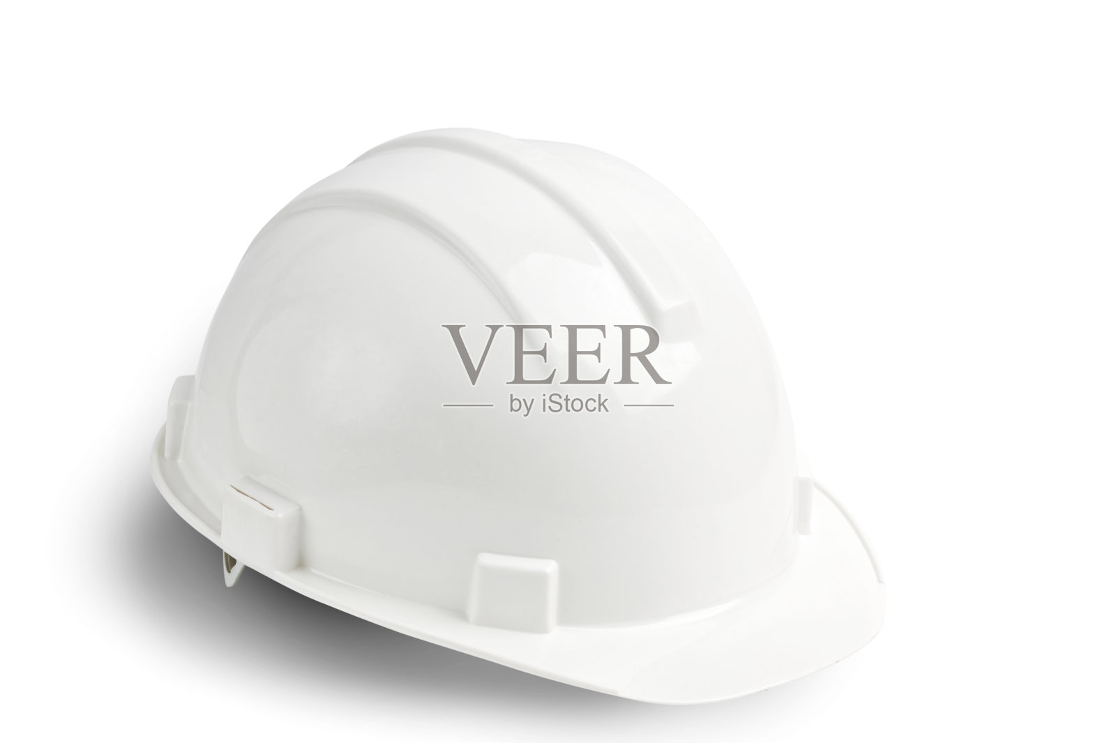 白色塑料安全帽孤立在白色背景和阴影照片摄影图片