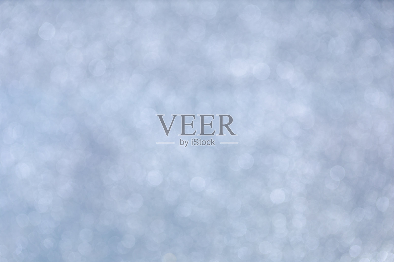 抽象模糊的软白色银色美丽的散景与闪亮的灯光背景为快乐的圣诞季节和新年喜庆的设计理念照片摄影图片