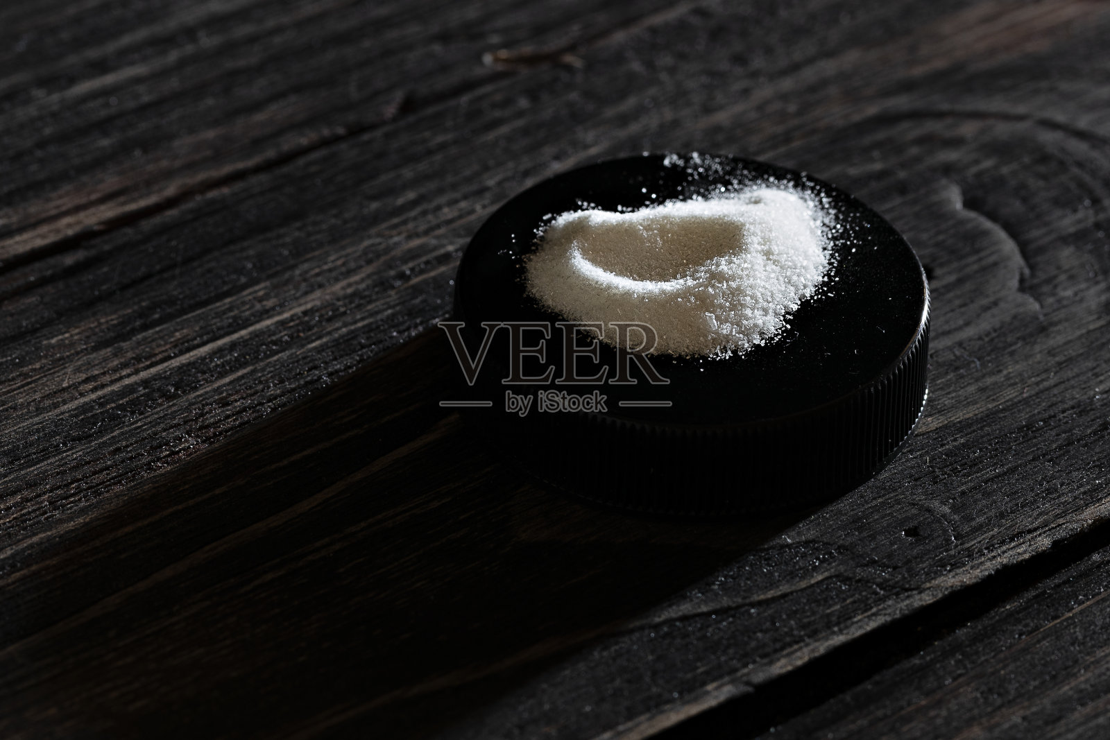 抗坏血酸钠选择性聚焦照片。饮食的概念。膳食补充低调照片。照片摄影图片