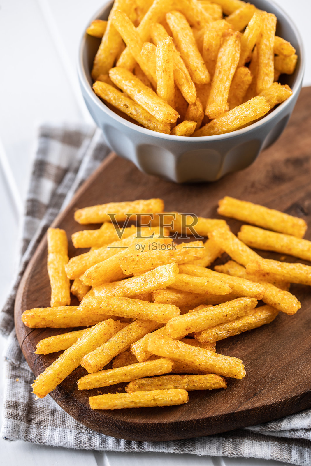 炸薯条。咸的零食。薯片。照片摄影图片