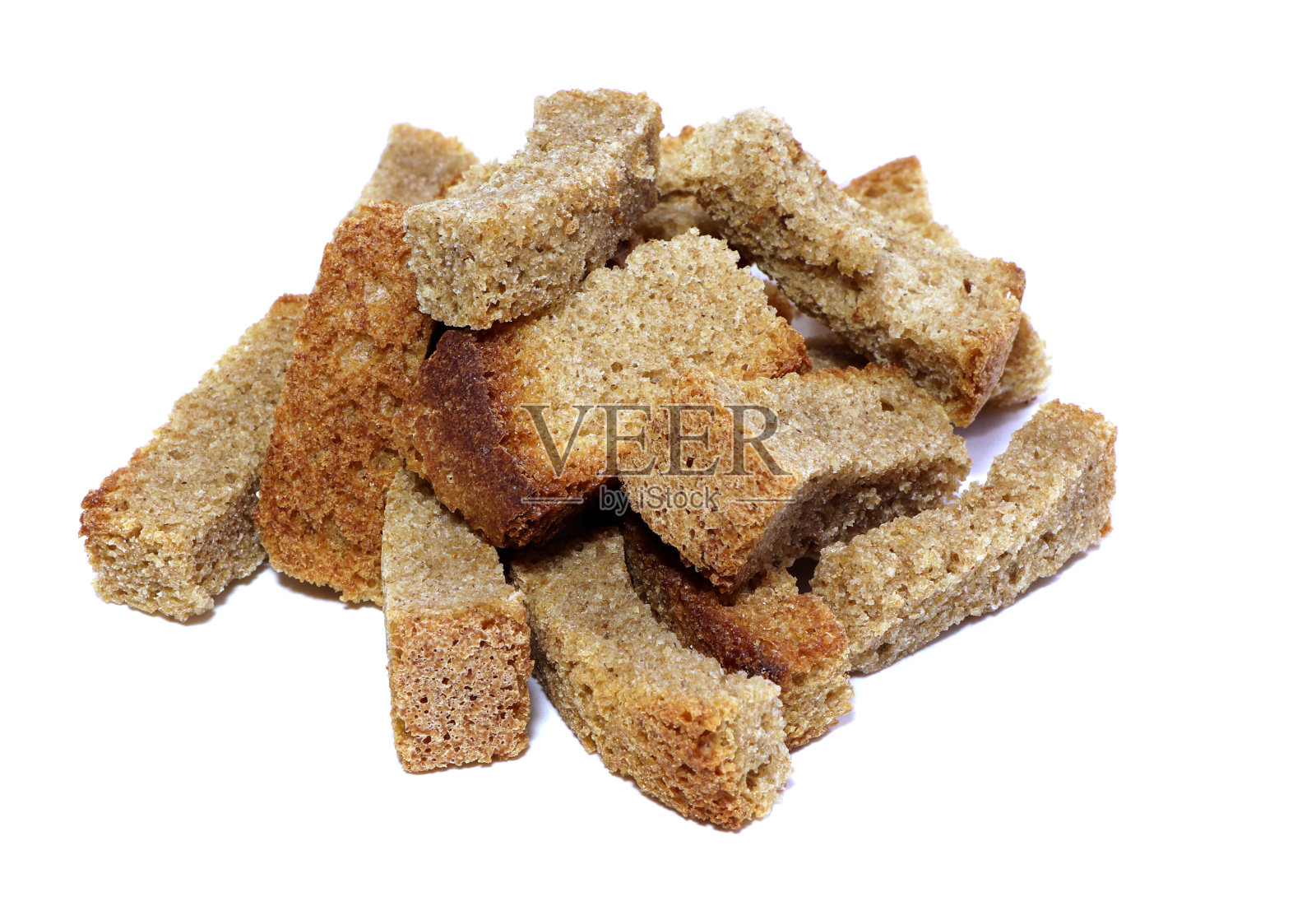 油炸面包丁孤立。干面包,地壳。面包屑孤立。面包在白色背景上有齿状。照片摄影图片