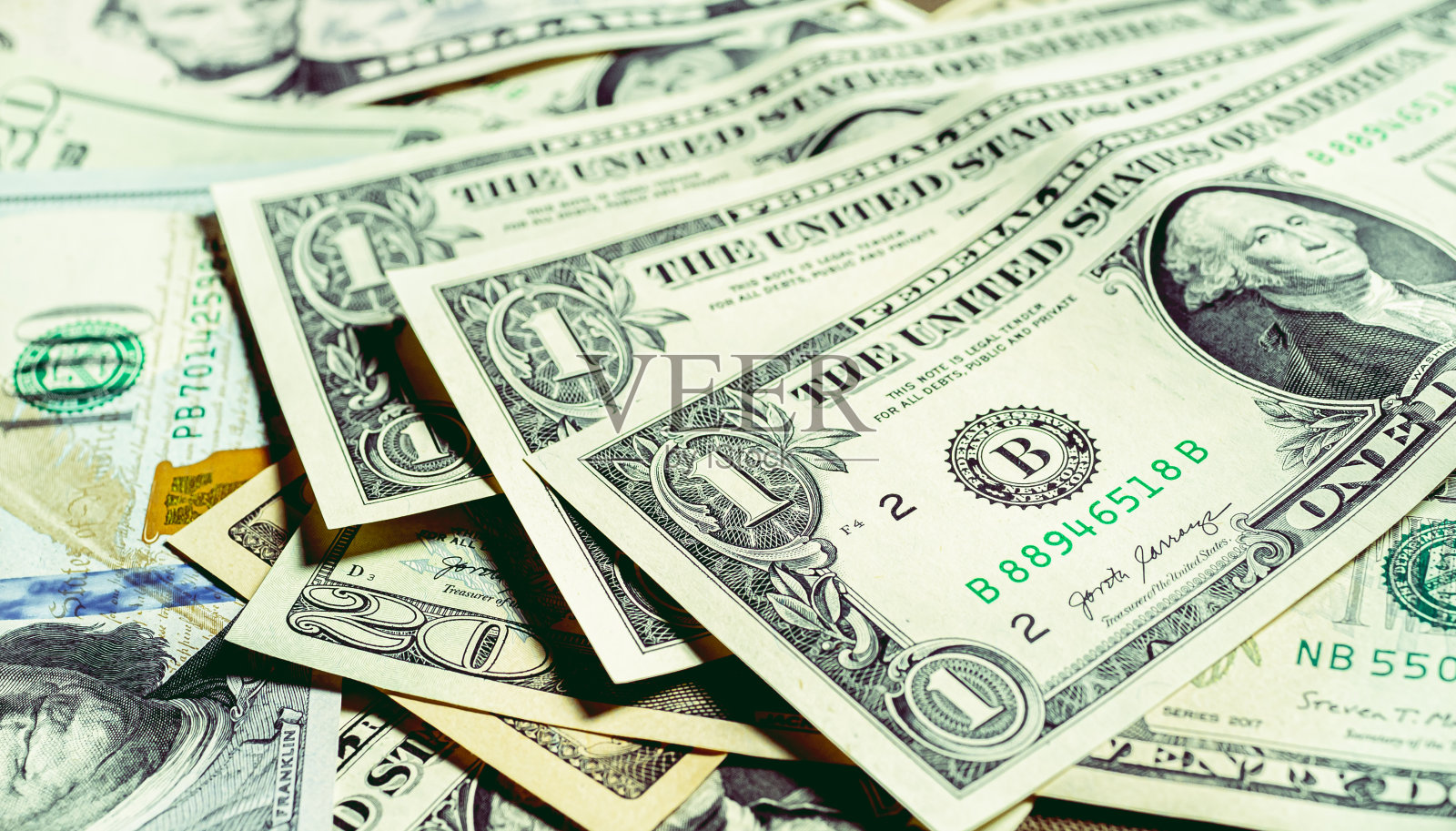 货币,美元纸币背景。美元钞票的特写。摄影为金融,经济和货币交换概念。照片摄影图片