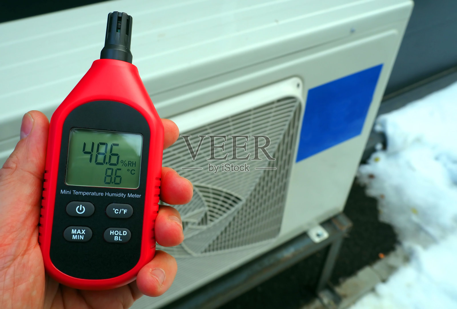 测量空气湿度和室内温度。照片摄影图片