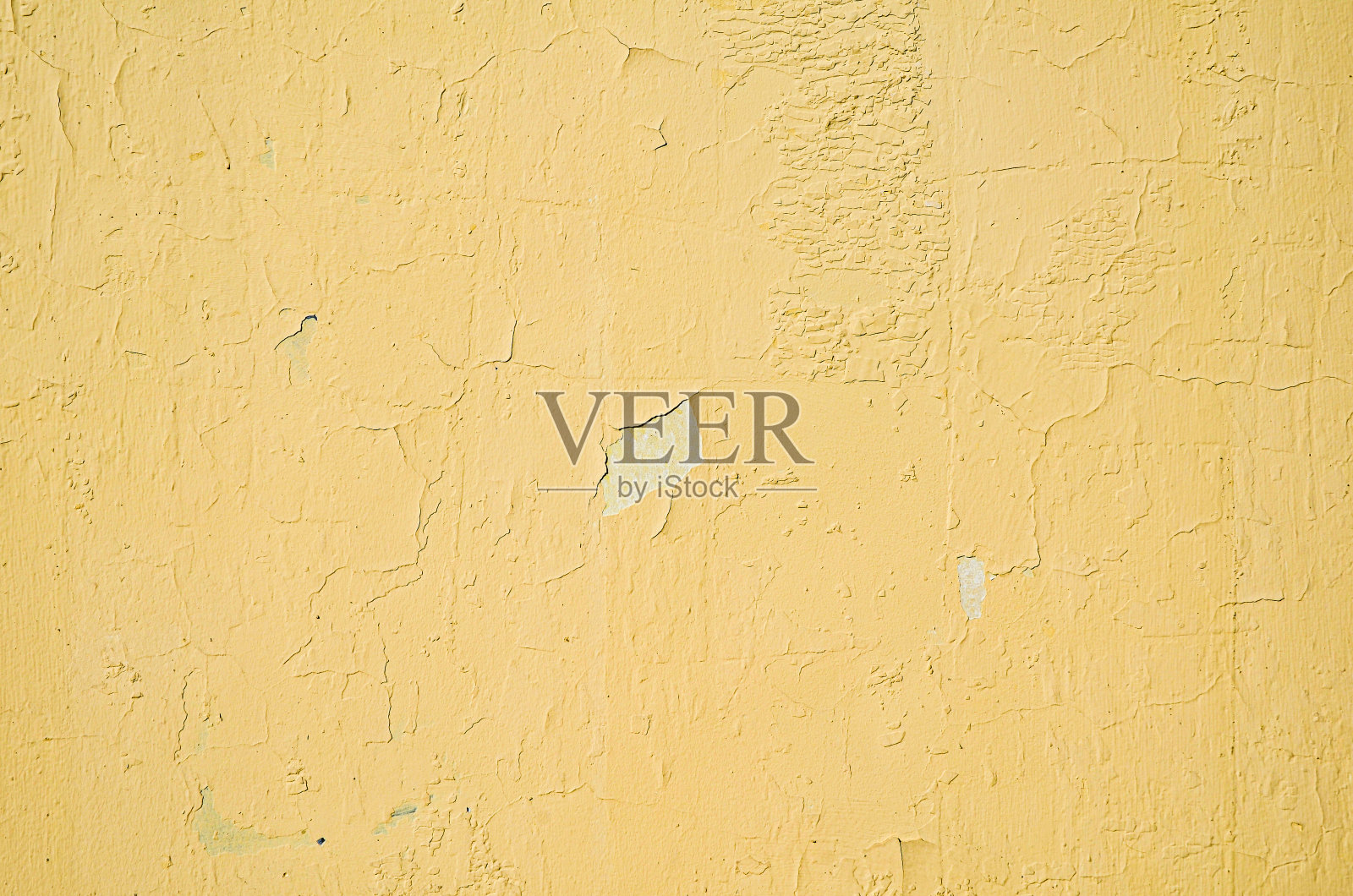黄墙碎片,有划痕和裂缝照片摄影图片