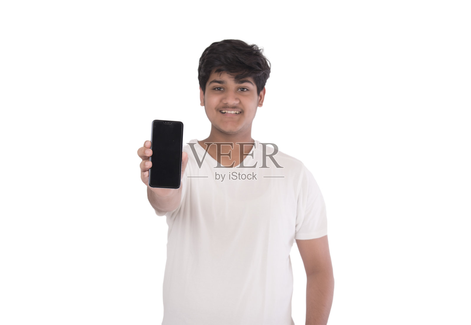 印度少年展示手机库存照片照片摄影图片