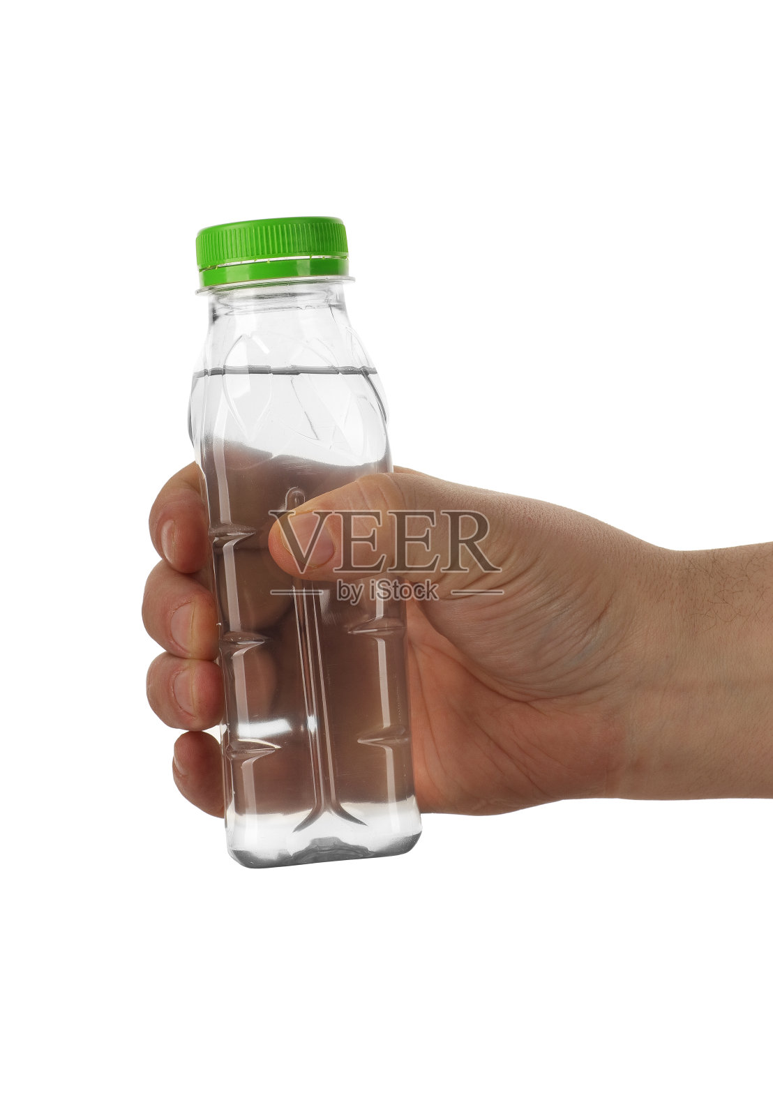 手里拿着一个小塑料瓶照片摄影图片