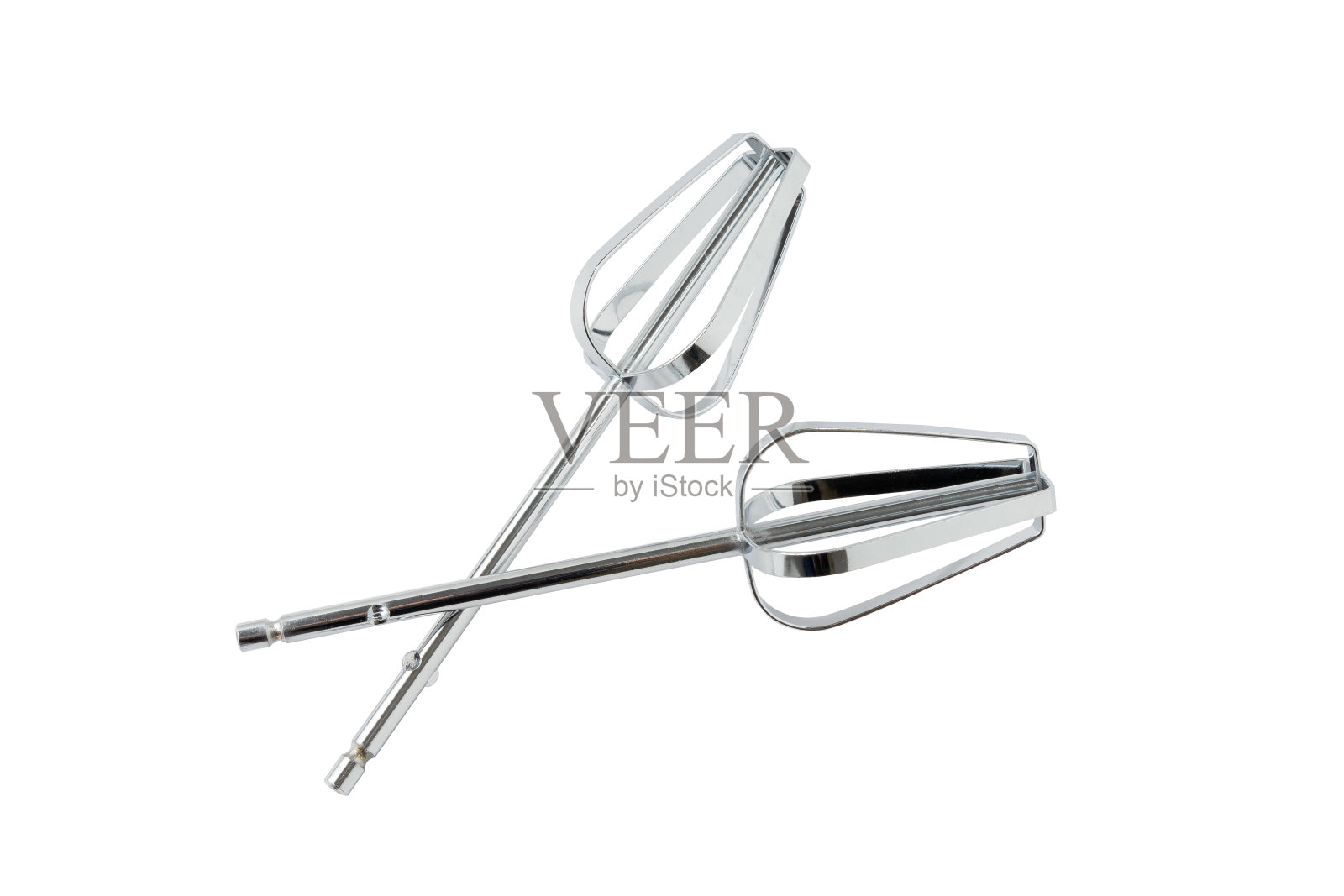 电动打蛋器附着在白色背景上。照片摄影图片