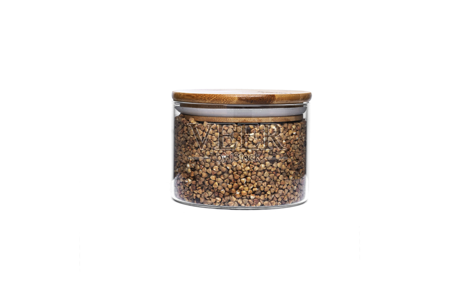 白色背景上有荞麦的玻璃罐照片摄影图片