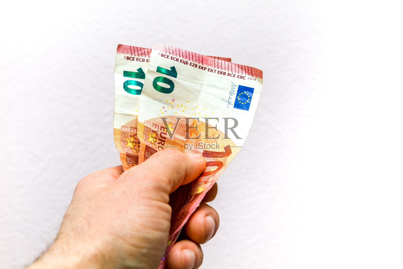 手里拿着钱照片摄影图片