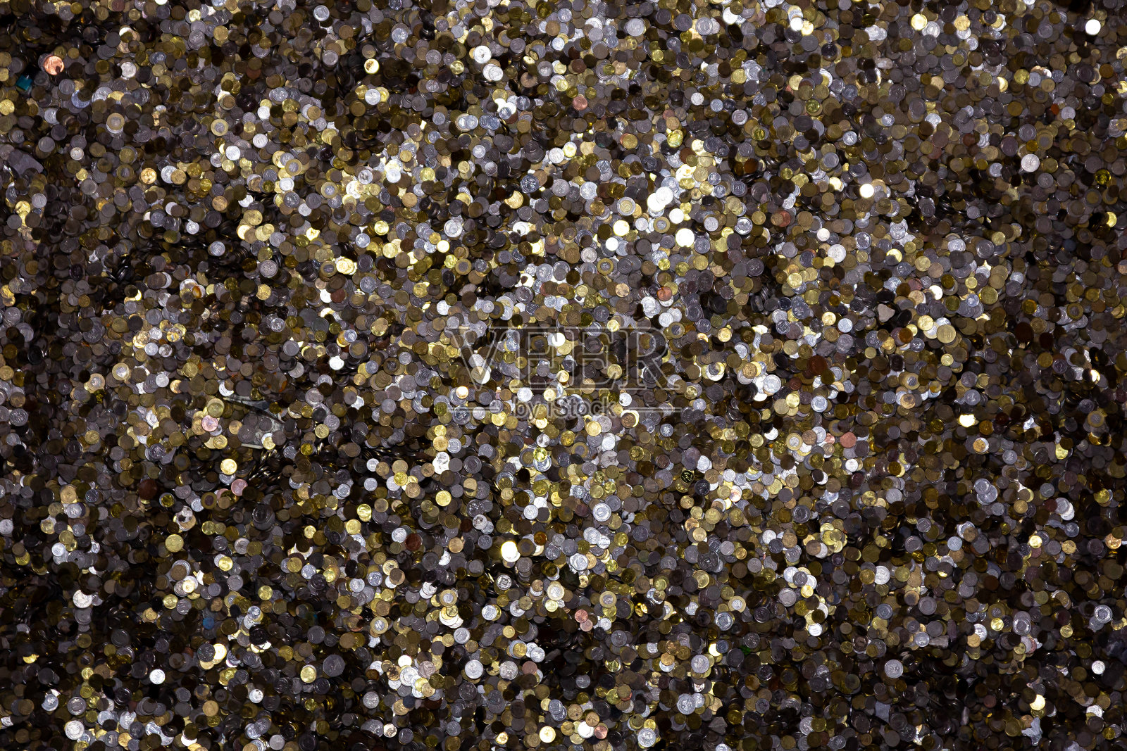 城堡的金库里收集了大量的硬币和纸币。照片摄影图片