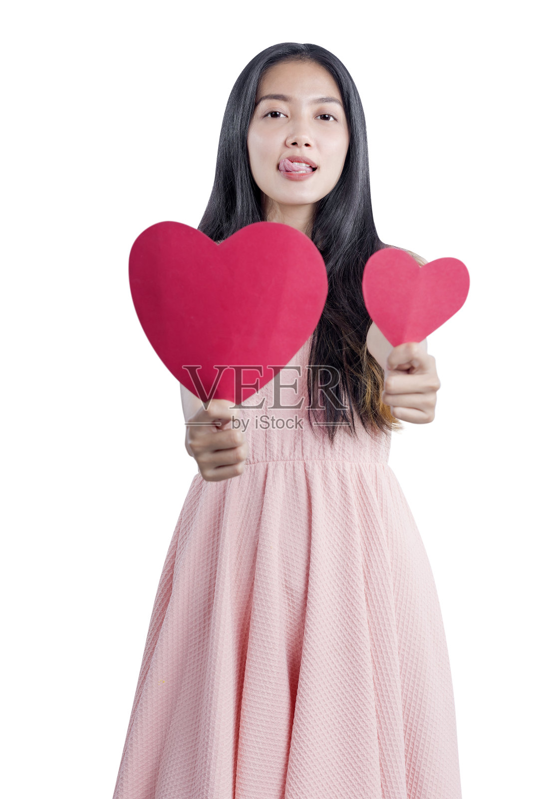 亚洲女人拿着红色的心照片摄影图片