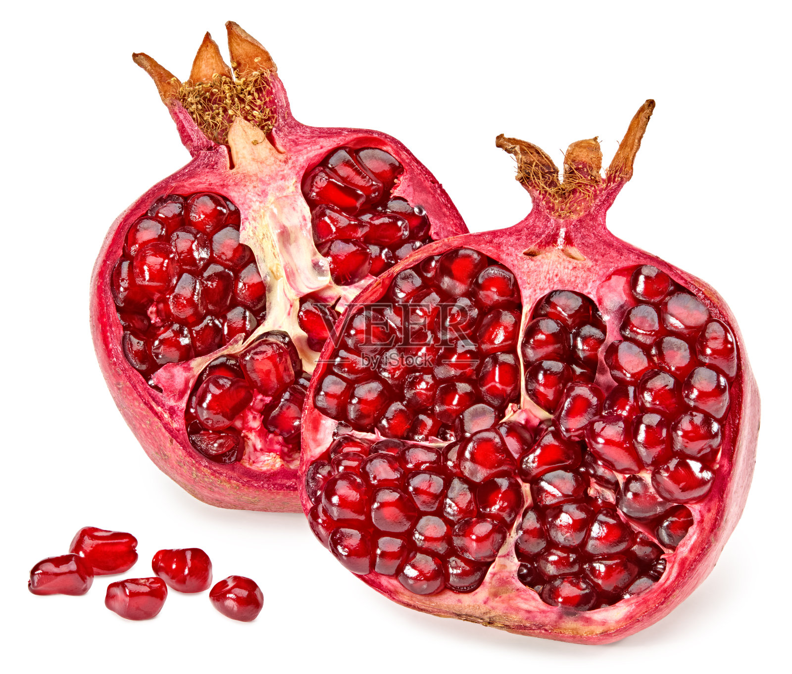 一块石榴,种子孤立在白色的背景上。剪切路径照片摄影图片